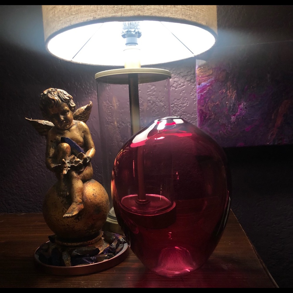 Beautiful Cranberry color hand blown round vase